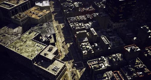 Aerial View of a Modern City with Moving Traffic
