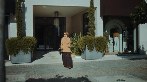 Charming woman explores boutique shops in a sunny afternoon