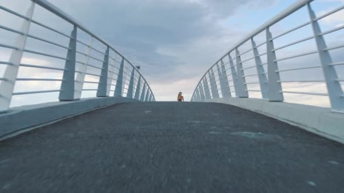 City, running and woman on bridge for fitness, athlete and workout routine for body goal