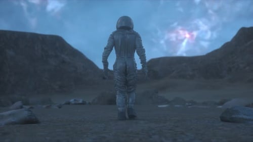 Astronaut Walking Across Rocky Alien Landscape Under Mysterious Sky Glow