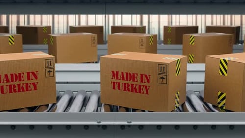 Cargo Boxes Made In Turkey Text On Roller Conveyor