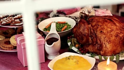 Festive Holiday Table Setting with Food and Gifts