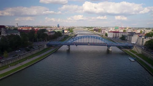 Beautiful Industrial City Of Krakow, Poland Along The Vistula River. Forward Aerial