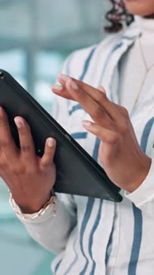 Hands, tablet and typing of business person online for report, email or feedback in office