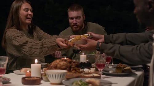Friends Gather for Cozy Candlelit Dinner