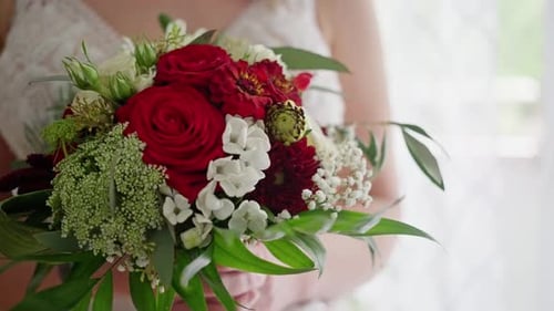 Bride Holding Wedding Bouquet Close Up View