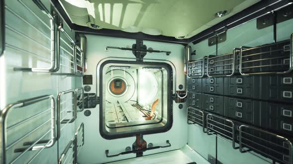 Interior of a Space Station Module Showing Storage and Airlock Design ...