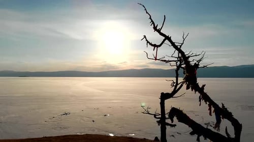 Beautiful Sunset or Sunrise Above Large Frozen Lake in Winter Aerial View Amazing Landscape in