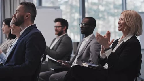 People Applauding at Corporate Business Conference