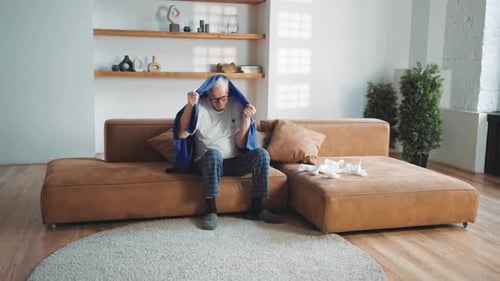 Elderly Man Feeling Chills or Fever Measuring Temperature at Home Sick Old Man Healthcare and