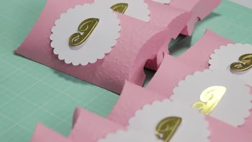 Pink Pillow Boxes with Gold Letter J Initial