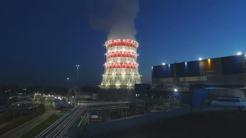 Aerial Motion From Station Building to Cooling Tower in Dusk