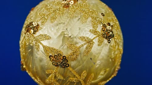 Goldenes rundes Spielzeug