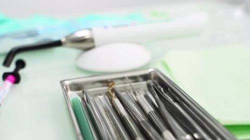 Dental Sterile Instruments in Metal Tray in Modern Dental Office Surgical Instruments in Operating