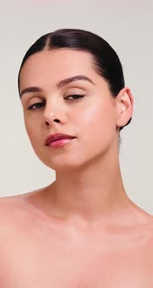 Woman, face and skincare with beauty for cosmetics or cosmetology on studio background