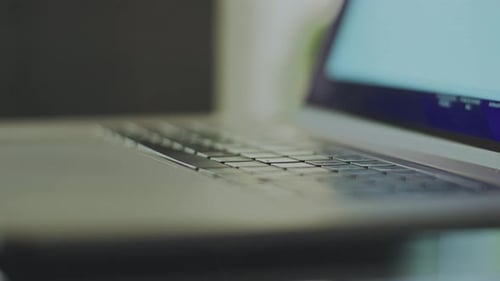 Blurry view of a laptop keyboard