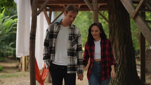 A Couple Embracing the Joy of Nature Together on Their Adventure in the Great Outdoors