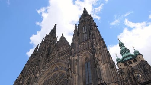 Medieval Gothic Building with Cloudgazing Facade and Spire