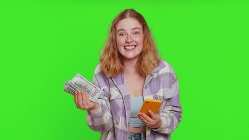 Young Woman Sees Cash Prize on Smartphone