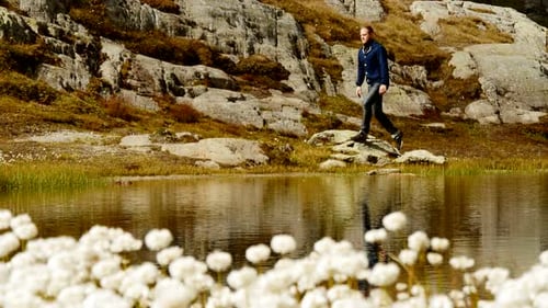 Man Walking in a Mountainous Nature Landscape