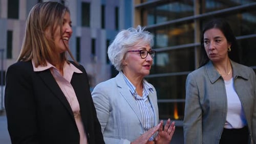 Side View Three Mature Relaxed Business Women Communicating Walking Outdoors Only Female Strolling