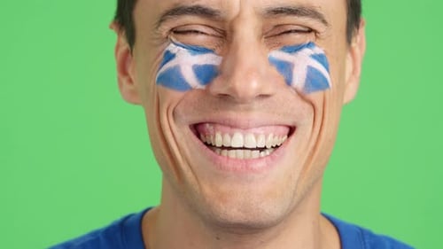 Adult Smiling with Face Paint Close Up Shot