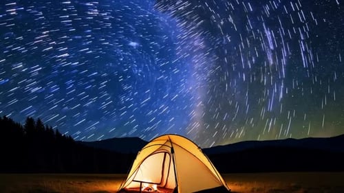 Animated Star Trails Over a Camping Tent in the Night Sky