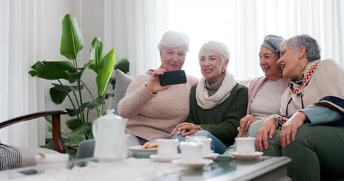 Senior Women Friends Taking Selfie with Cellphone
