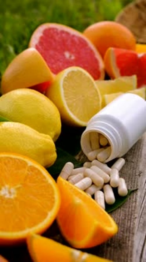 Citrus Fruits with Vitamin C Supplements Outdoors