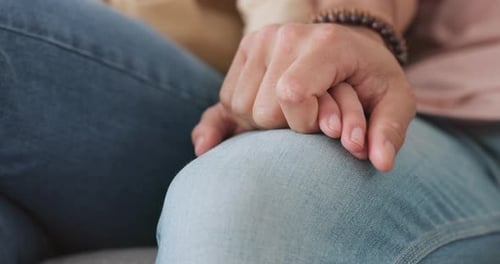 Intimate Couple Holding Hands in Close Up