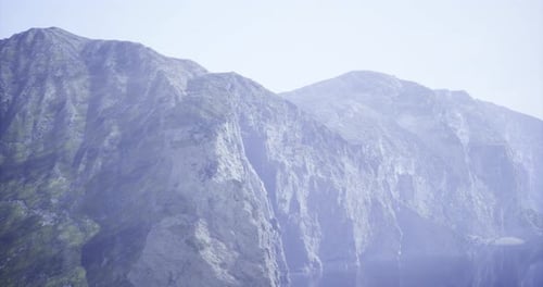 Majestic Mountain Landscape with Clear Skies and Rocky Terrain in Daylight