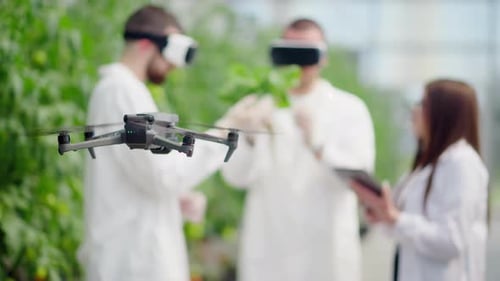 Scientists Using VR and Drones in Greenhouse