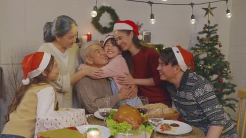 Happy Multi-Generation Family Christmas Celebration at Home