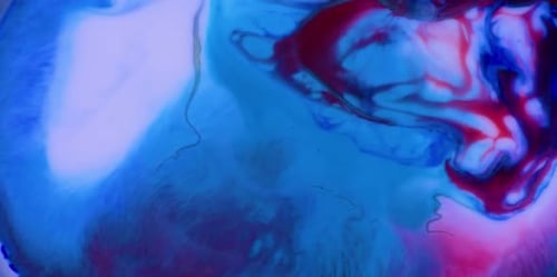 Abstract Red and Blue Ink Swirling Background