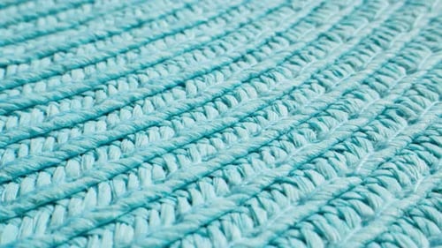 Woman Summer Blue Straw Hat Texture Closeup View of Woven Turquoise Material Macro Perspective