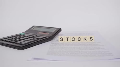 Word STOCKS on scrabble