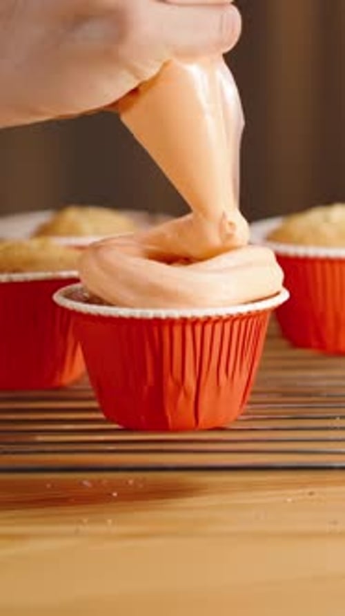 Icing a Delicious Cupcake with Swirl