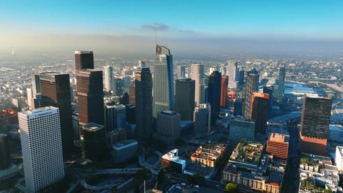 Approaching the tops of skyscrapers in Los Angeles downtown in the morning.