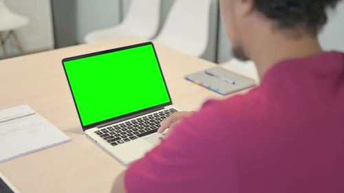 Close up of African Man Using Laptop with Green Screen