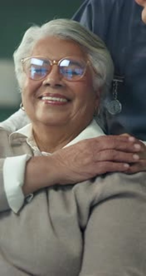 Caregiver, support and senior woman in nursing home for assistance, comfort or bonding together