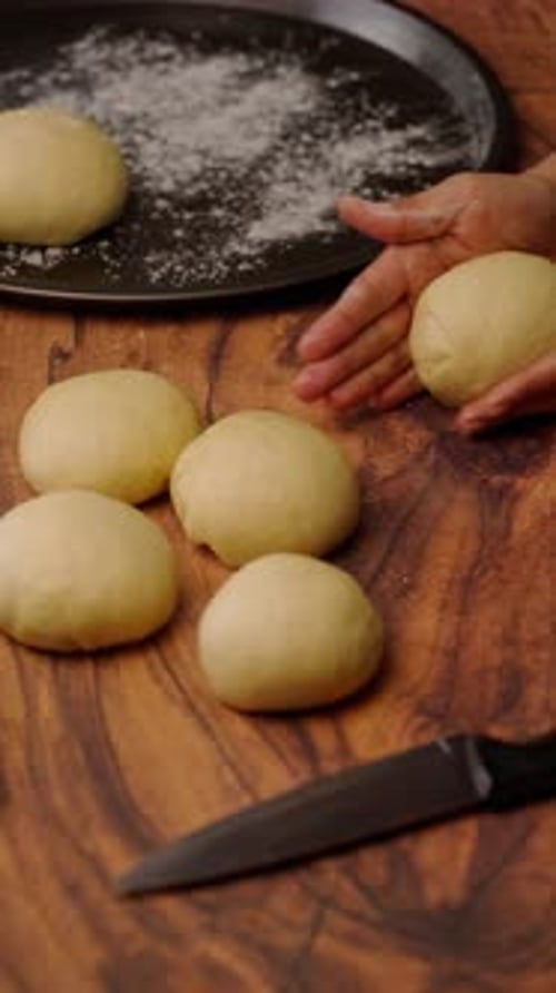 Vertical Bakery Video, Rolling Yeast Dough To Make Homemade Bread