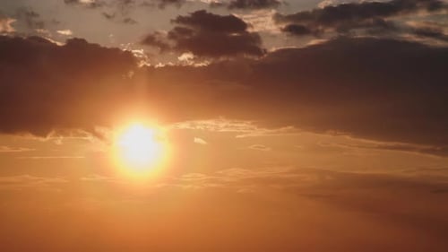 Vibrant Sunset over the Clouds at Golden Hour