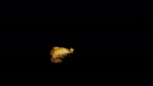 Ignite Collection: A rapid puff of a fireball released from right to left in center on dark backgrou