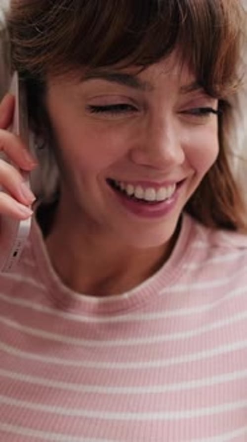 Woman Smiling Talking on Cell Phone Close Up