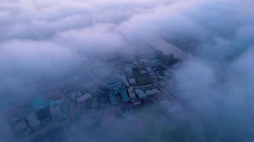Aerial view of buildings under clouds, Nigeria.
