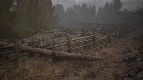 An Old Wood Fence with a Country Field Behind It