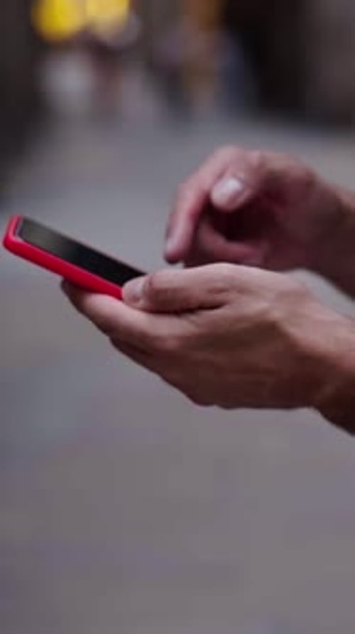 Close Up of Hands of an Unrecognizable White Man Using Phone to Be Connected One Social Media Apps