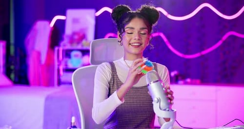 Girl, sound and influencer in home with microphone on social media platform to online audience