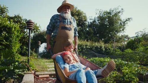 Family having fun in the vegetable garden