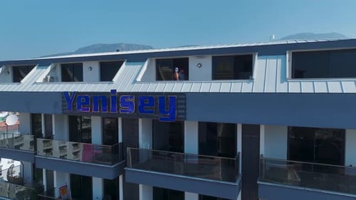 Aerial View Beautiful Residential Complex With Azure Pool and Kids' Water Slides By the